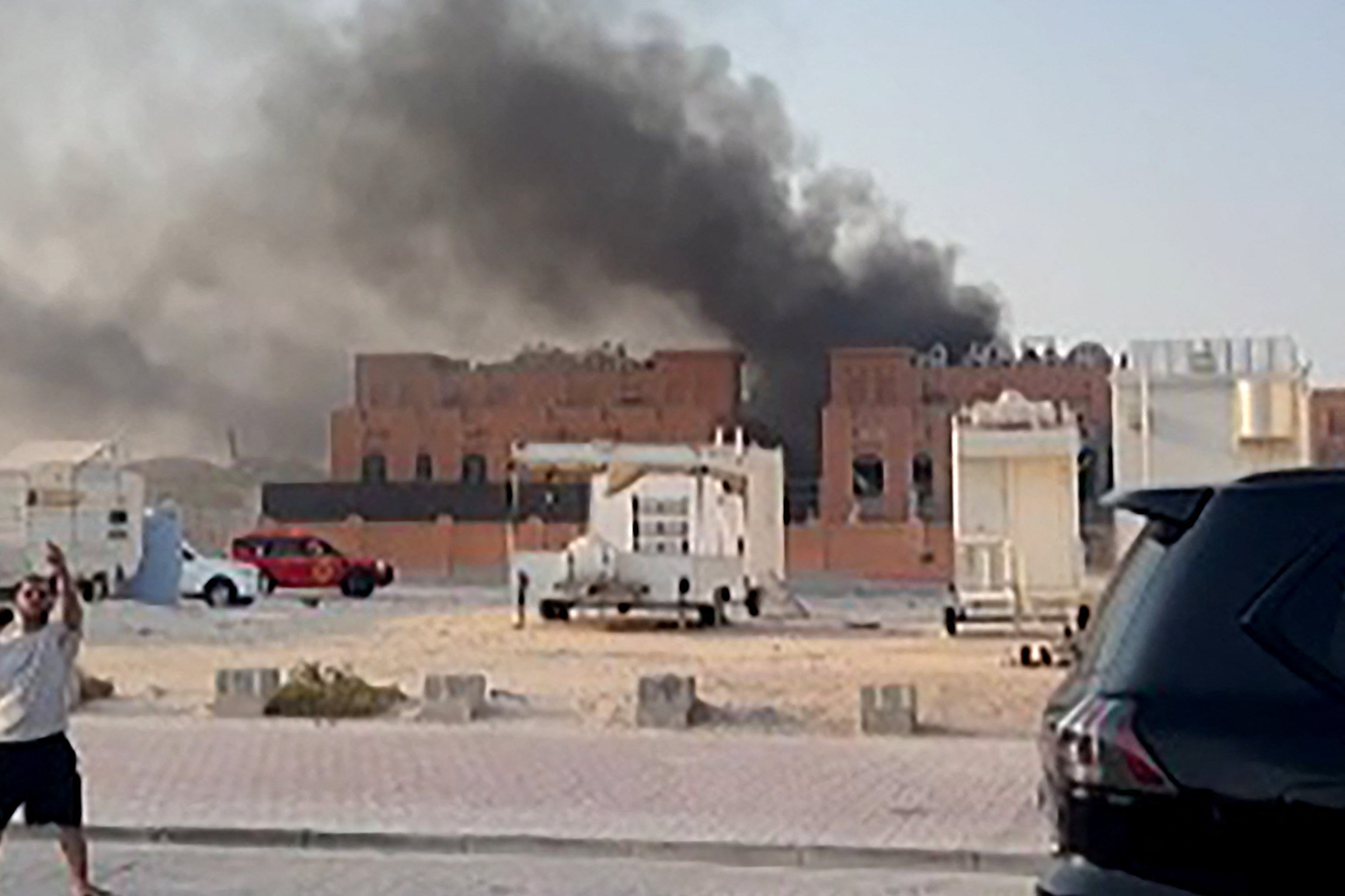 This frame grab taken from an AFPTV footage shows smoke billowing after explosions in Qatar's capital Doha on September 9, 2025. Israel's military said it carried out air strikes on 9 September targeting senior Hamas leaders in the Qatari capital Doha