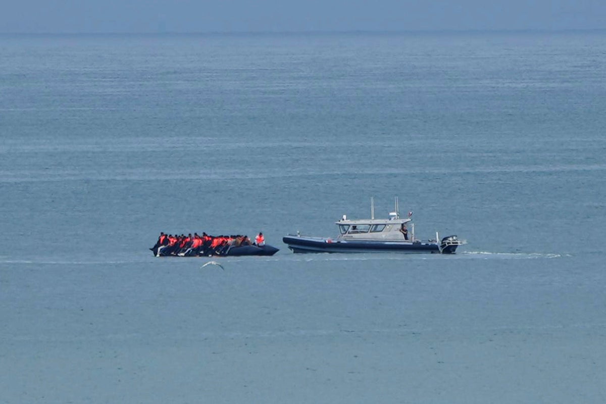 First migrants arrive in UK from France under the 'one in, one out' policy