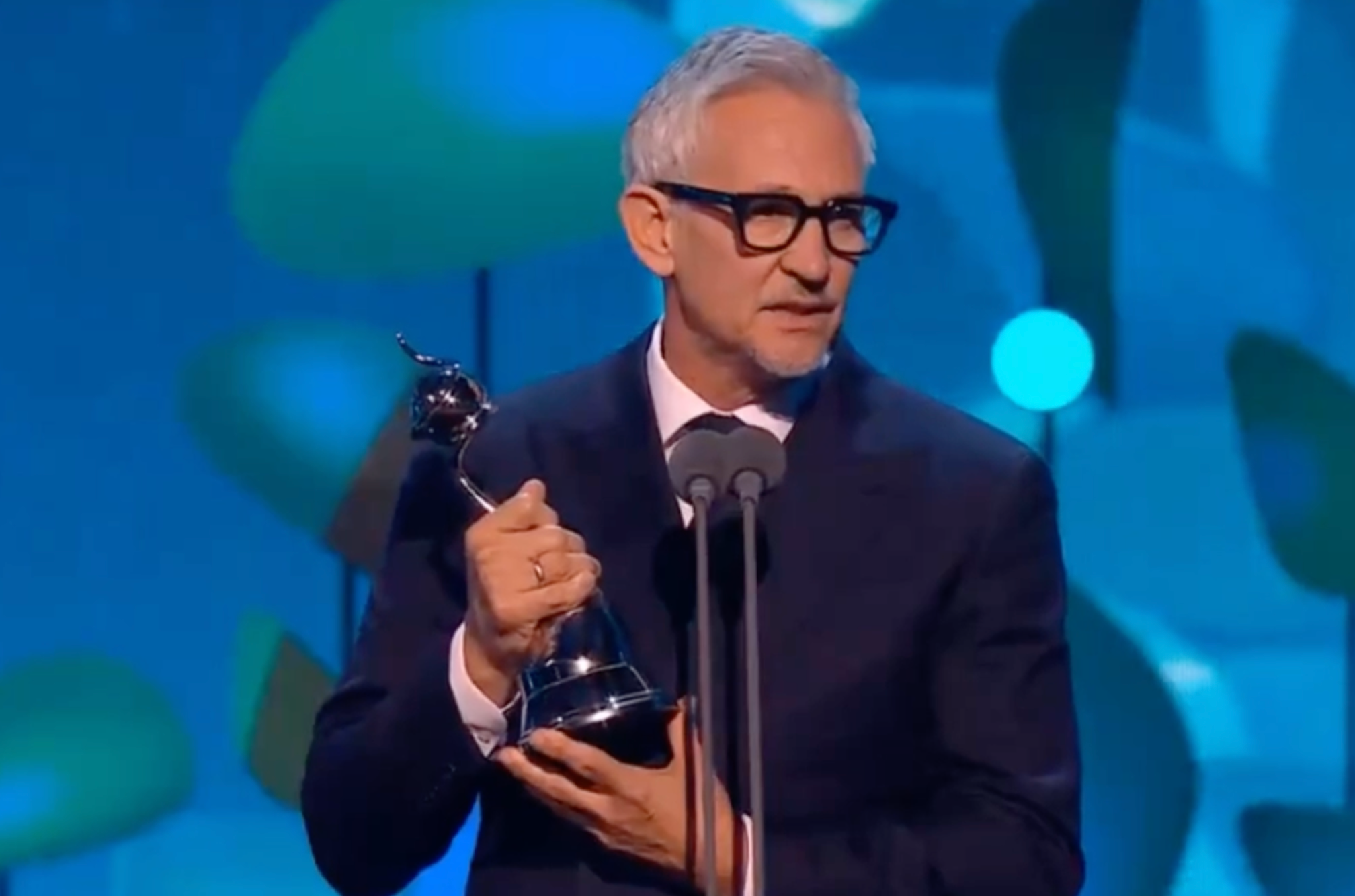 Gary Linker collecting his award for best presenter