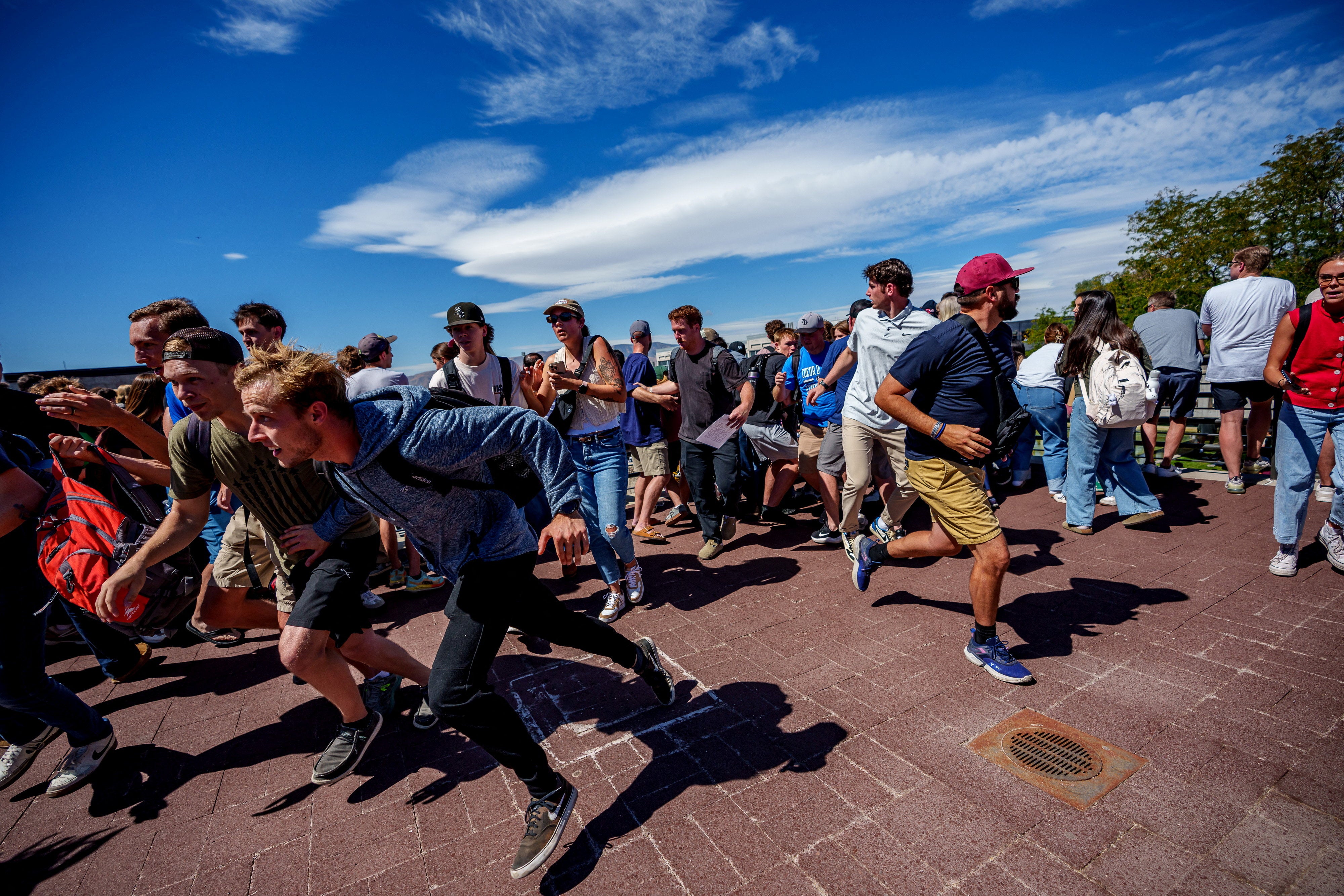 Students panicked after the shot rang out an crowds ran for cover