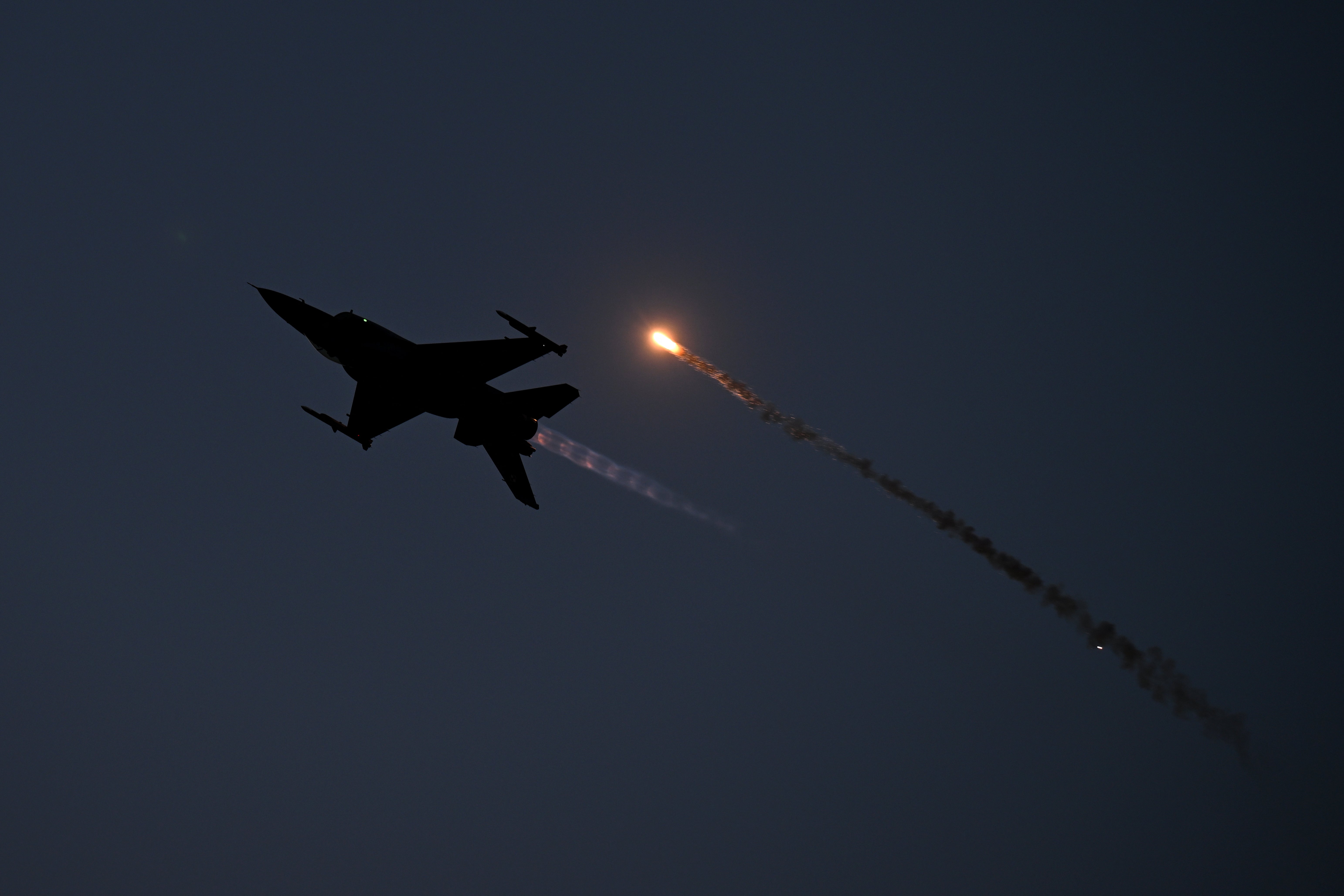 An F-16C fighter aircraft performs during the Antidotum airshow in Leszno, Greater Poland region, on June 22, 2024