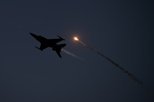 <p>An F-16C fighter aircraft performs during the Antidotum airshow in Leszno, Greater Poland region, on June 22, 2024</p>
