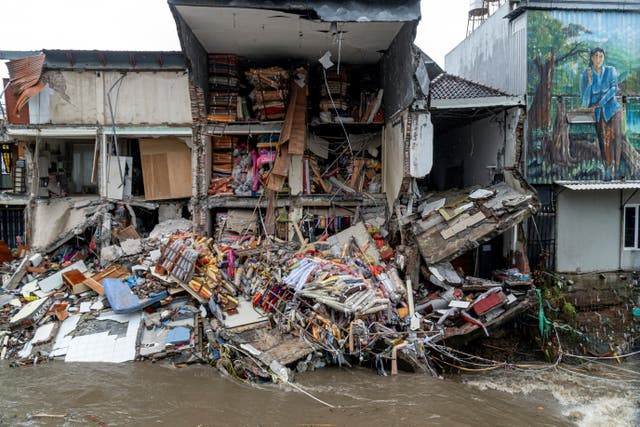 <p>A fabric store that collapsed after being hit by floods in Denpasar, Bali</p>