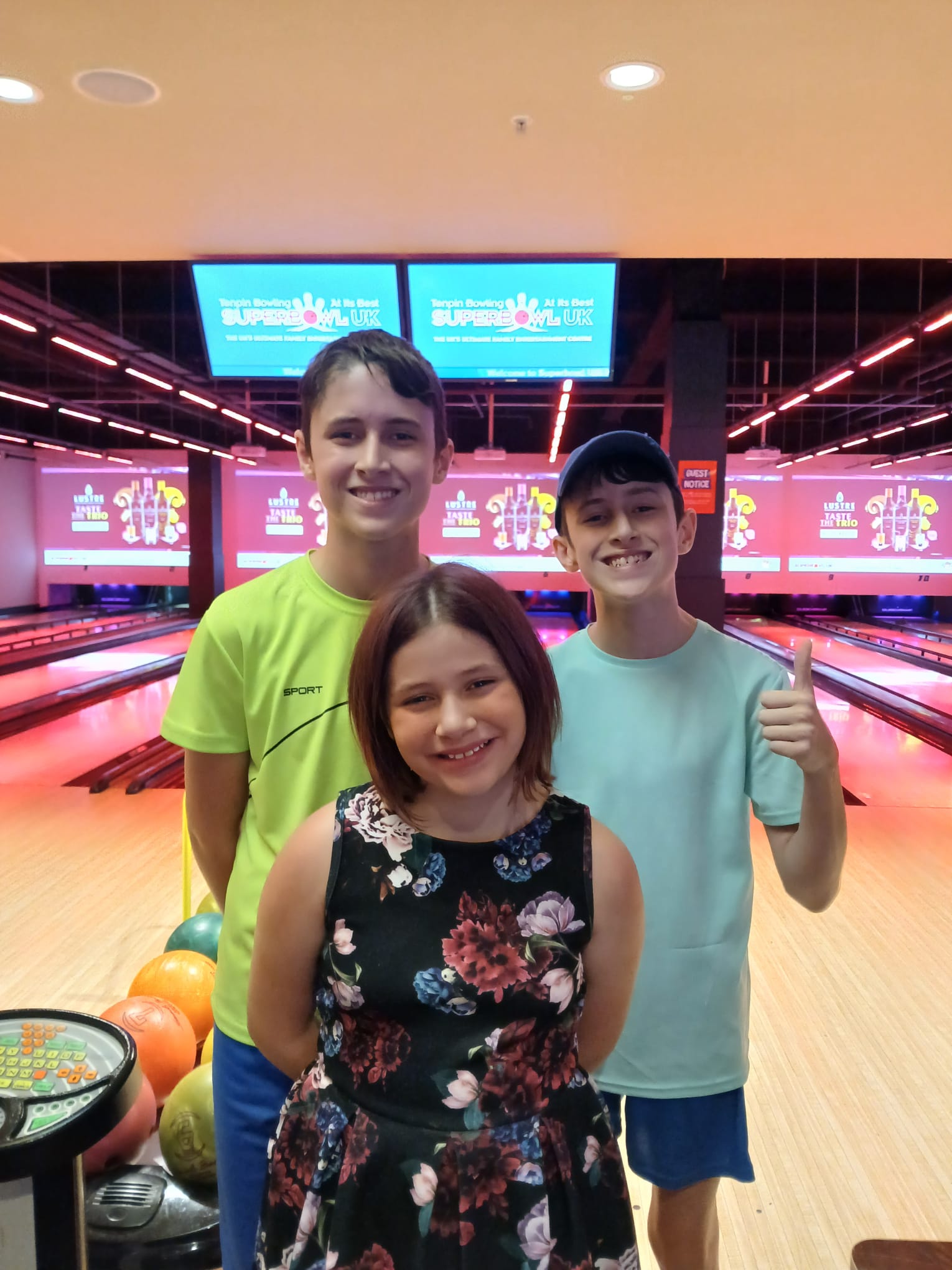 Jessica (front) with her two brothers, Noah (right) and Riley (left)