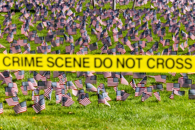 <p>Crime scene tape flies in front of a 9/11 memorial following the fatal shooting of political activist Charlie Kirk during an event at Utah Valley University on September 11, 2025 in Orem, Utah</p>