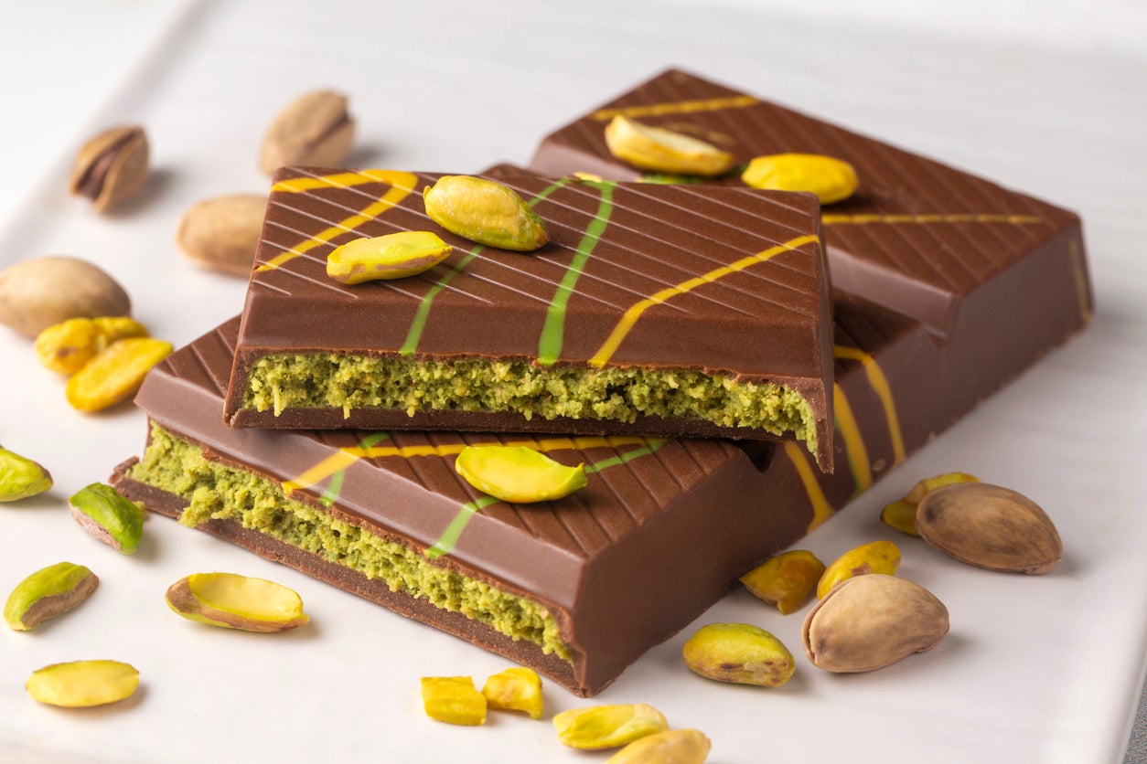 Dubai chocolate is a dessert prepared with milk and dark chocolate, roasted shredded wheat, pistachio paste and tahini.
