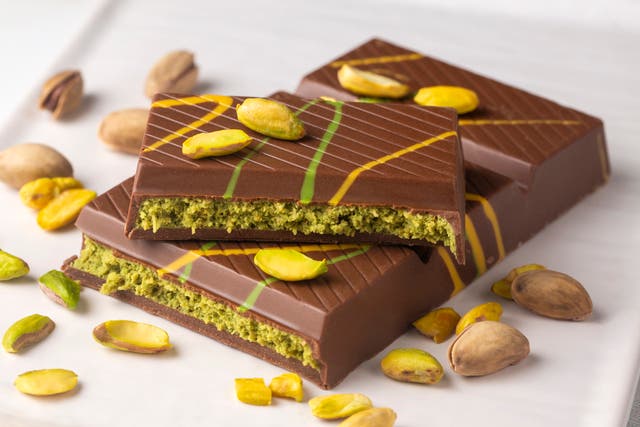 <p>Dubai chocolate is a dessert prepared with milk and dark chocolate, roasted shredded wheat, pistachio paste and tahini.</p>