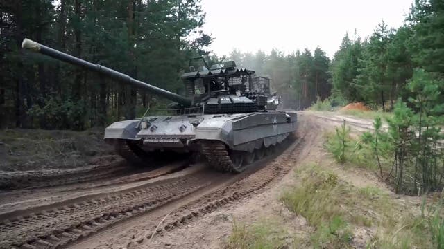 <p>This shot from a Russian military video handout shows a tank during a military drill in an unspecified location</p>