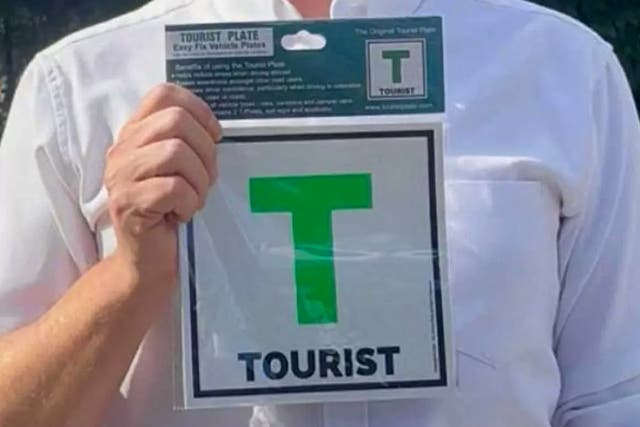 <p>The green “T plates” have "tourist" written at the bottom </p>