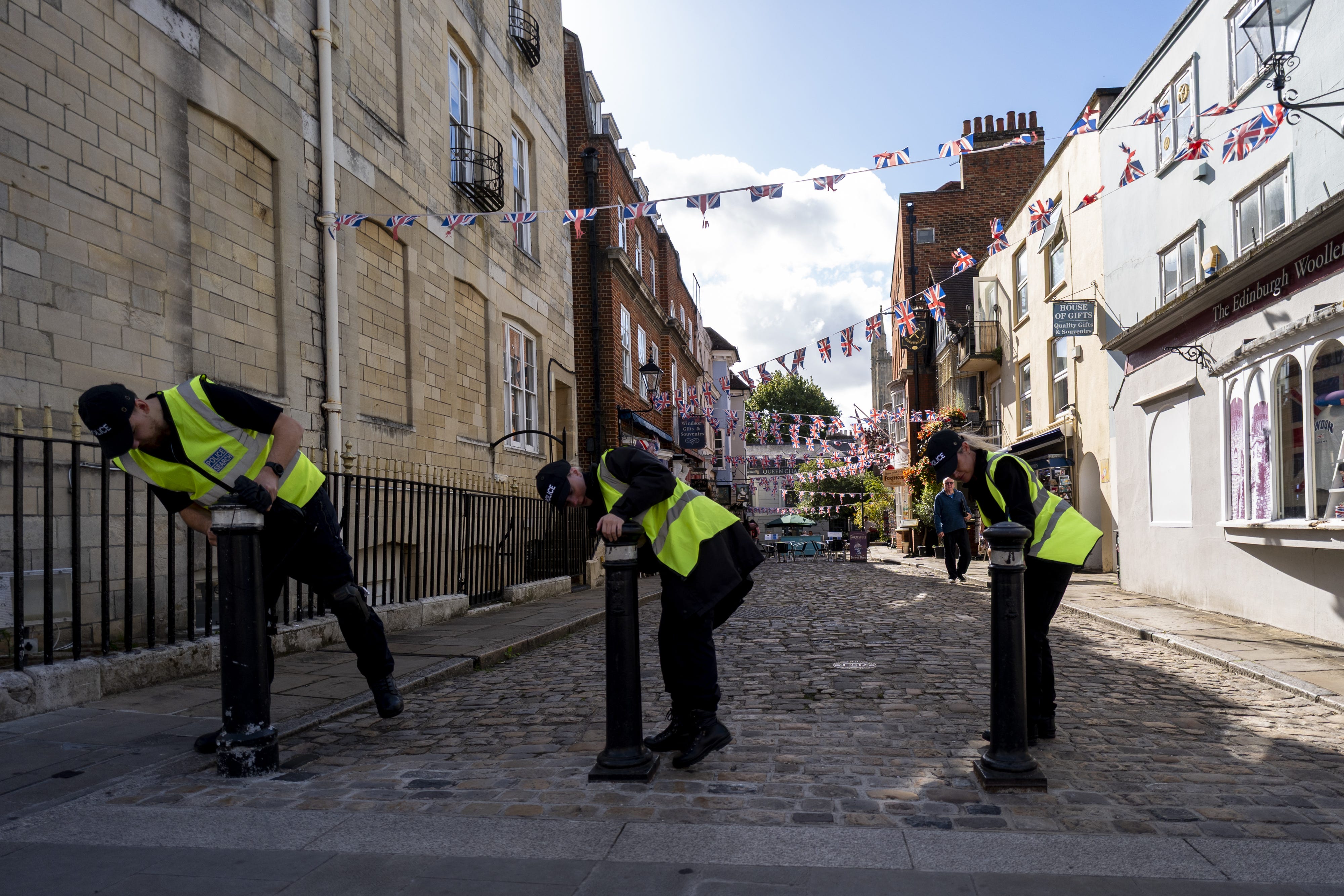 Thames Valley Police officers from carry out security searches in Windsor ahead of Donald Trump’s state visit (Jordan Pettitt/PA)
