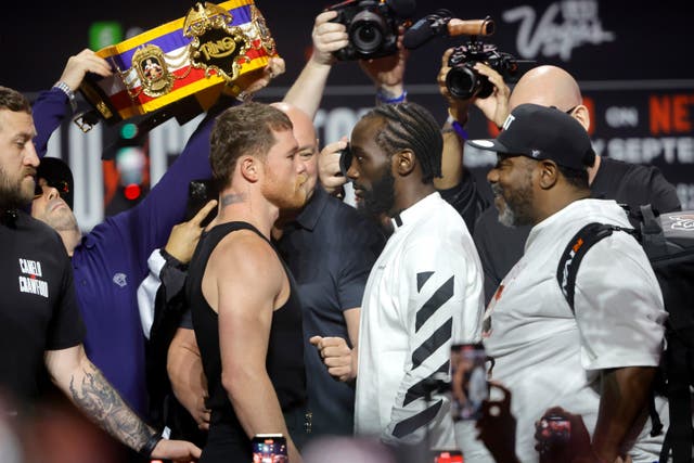 <p>Canelo Alvarez and Terence Crawford facing off</p>