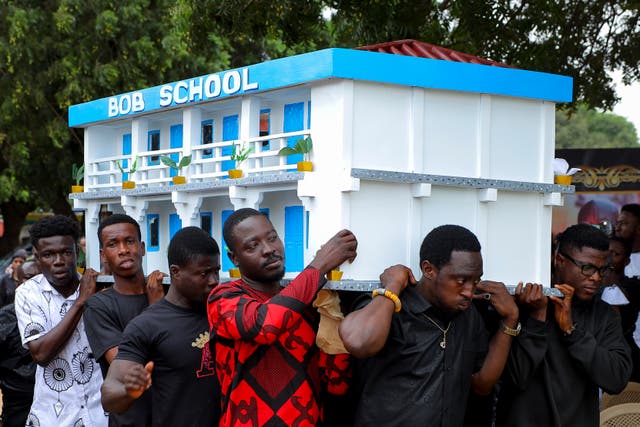 <p>Men carry the fantasy coffin of the late Robert Nii Anang Obodai, a former school proprietor, during his funeral in Accra</p>