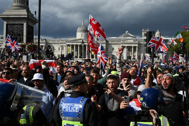 <p>Police officers confront the supporters of British anti-immigration activist Stephen Yaxley-Lennon, also known as Tommy Robinson, during a demonstration of Stand Up to Racism campaign group, in London, Britain, September 13, 2025. REUTERS/Chris J. Ratcliffe</p>