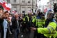 Dozens of police officers injured and 25 arrests as huge Tommy Robinson rally marred by violence