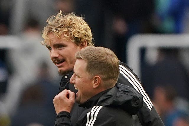 Newcastle boss Eddie Howe (right) was delighted with striker Nick Woltemade’s match-winning debut against Wolves (Owen Humphreys/PA)