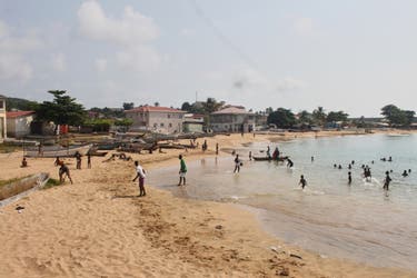 <p>People swim and spend a day at the beach in Annobón Island, Equatorial Guinea</p>