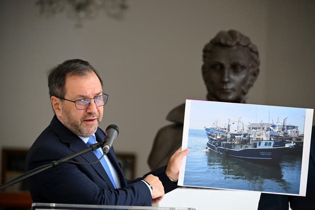 <p>Venezuela's Foreign Minister Yvan Gil shows a picture of a fishing boat during a press conference at the Ministry of Foreign Affairs in Caracas September 13. Venezuela on Saturday hit out at the United States for allegedly seizing a fishing boat for eight hours in its exclusive economic zone, as the US military patrols the Caribbean to target drug cartels</p>