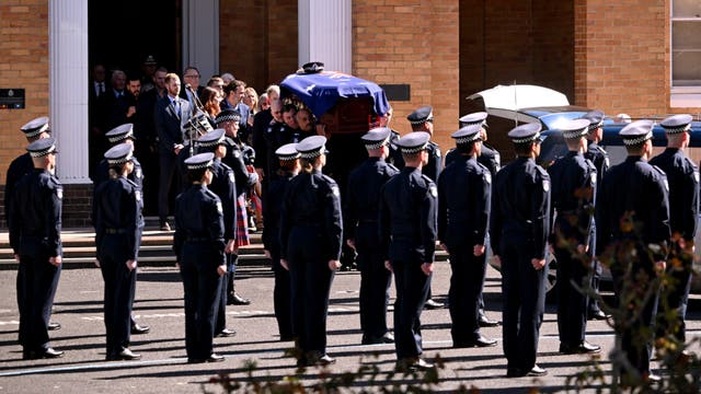 <p>Coffin of police officer Senior Constable Vadim de Waart-Hottart, killed in a shooting at Porepunkah in Victoria's north-east last week</p>