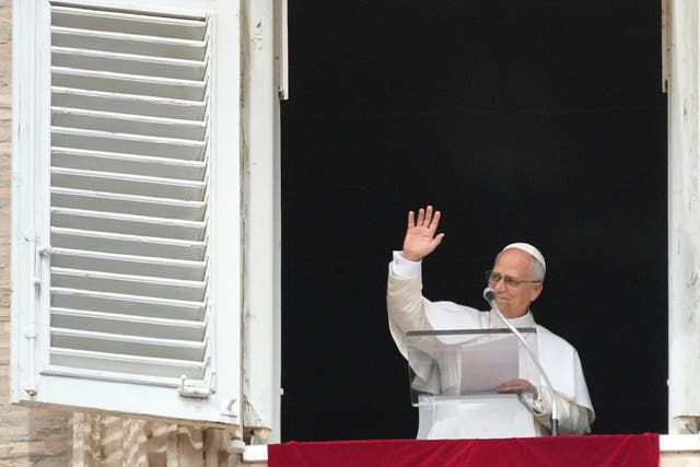 <p>Pope Leo XIV appears at his studio's window to bless the faithful gathered in St. Peter's Square at the Vatican for the Angelus prayer, Sunday, Sept. 14, 2025. (AP Photo/Gregorio Borgia)</p>