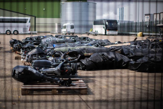 A view of small boats and engines used to cross the Channel (James Manning/PA)