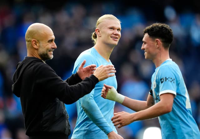 <p>Erling Haaland (centre) and Phil Foden (right) helped inspire Pep Guardiola’s (left) Man City to a big win</p>