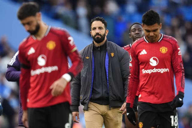 Ruben Amorim, centre, again insisted he will not change his tactical approach (Nick Potts/PA)