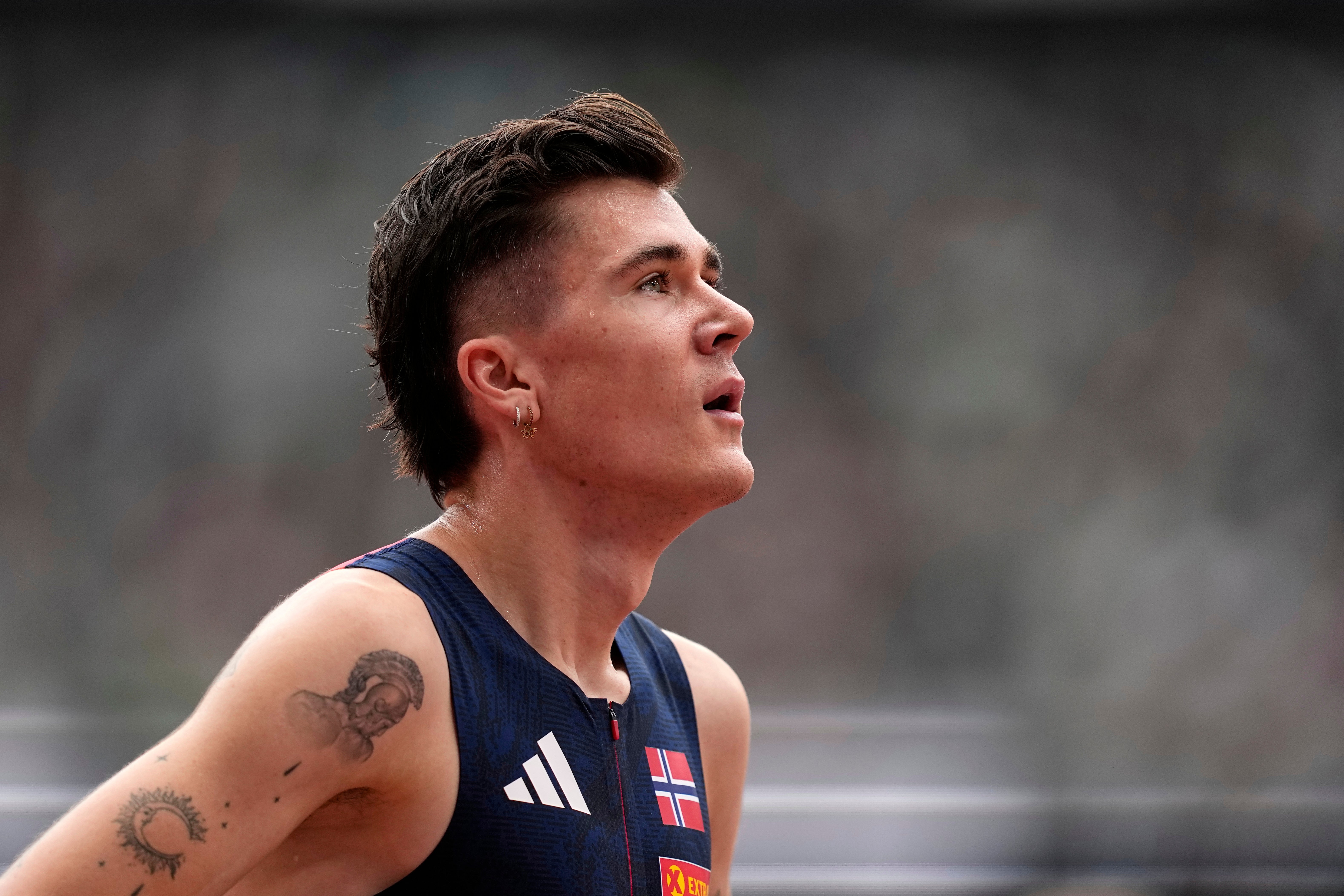 Norway's Jakob Ingebrigtsen reacts after finishing a men's 1,500 meters heat at the World Athletics Championships