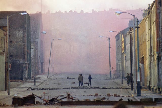<p>Haze from smoke bombs released by British troops in the bogside district of Londonderry on February 1, 1972</p>