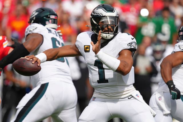 Philadelphia Eagles quarterback Jalen Hurts throws during the first half of an NFL football game against the Kansas City Chiefs (Ed Zurga/AP)