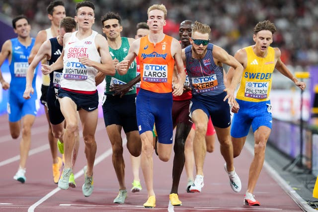 Josh Kerr, second right, and Jake Wightman, left, cross the finish line behind Niels Laros, centre (Martin Rickett/PA)