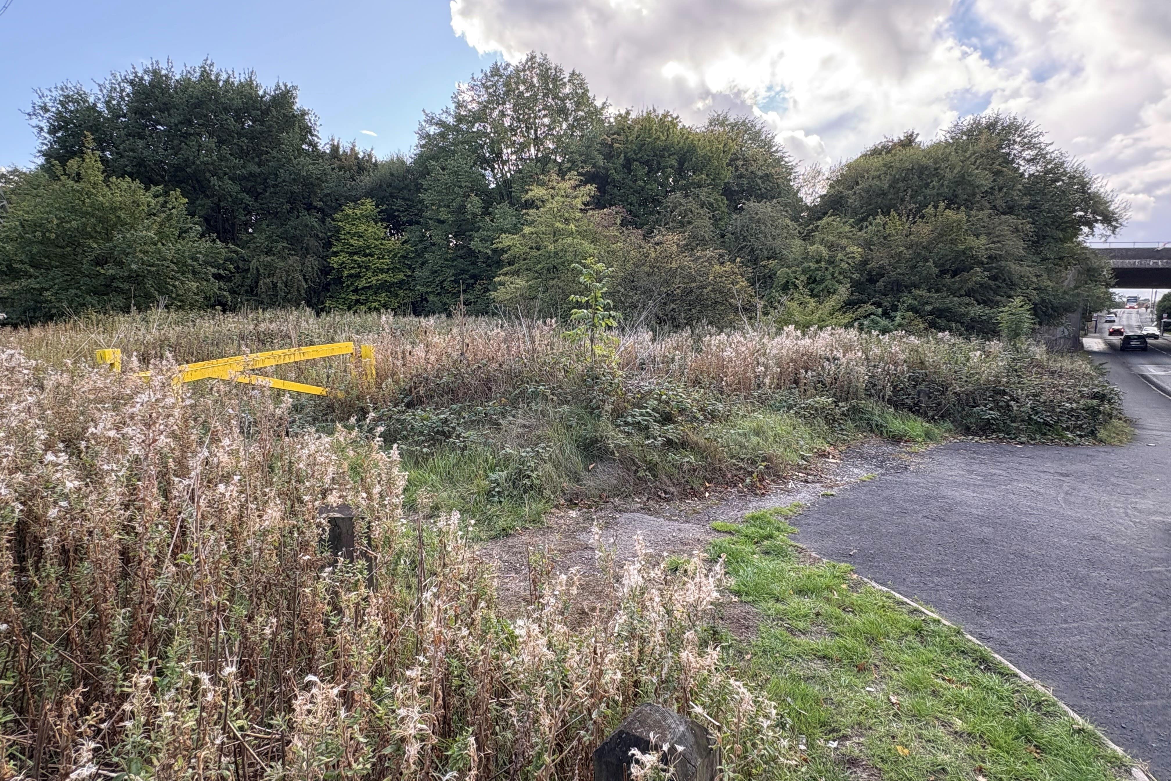 A previously sealed-off area of grassland near Tame Road in Oldbury (Matthew Cooper/PA)