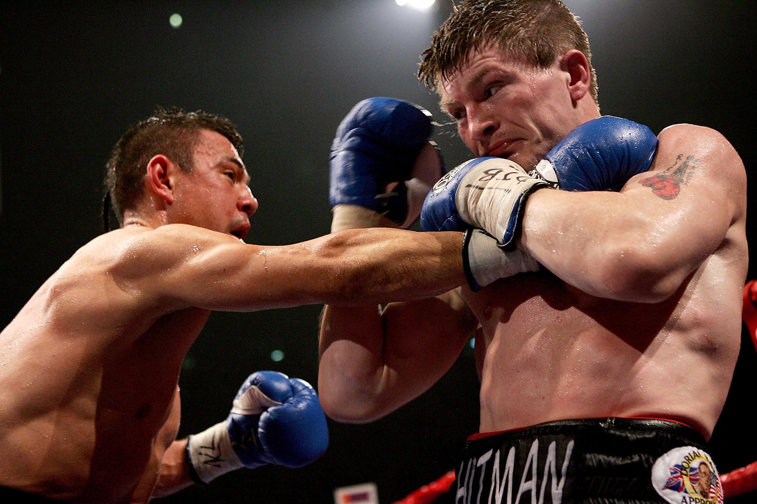 Hatton in action against Kostya Tszyu in Manchester