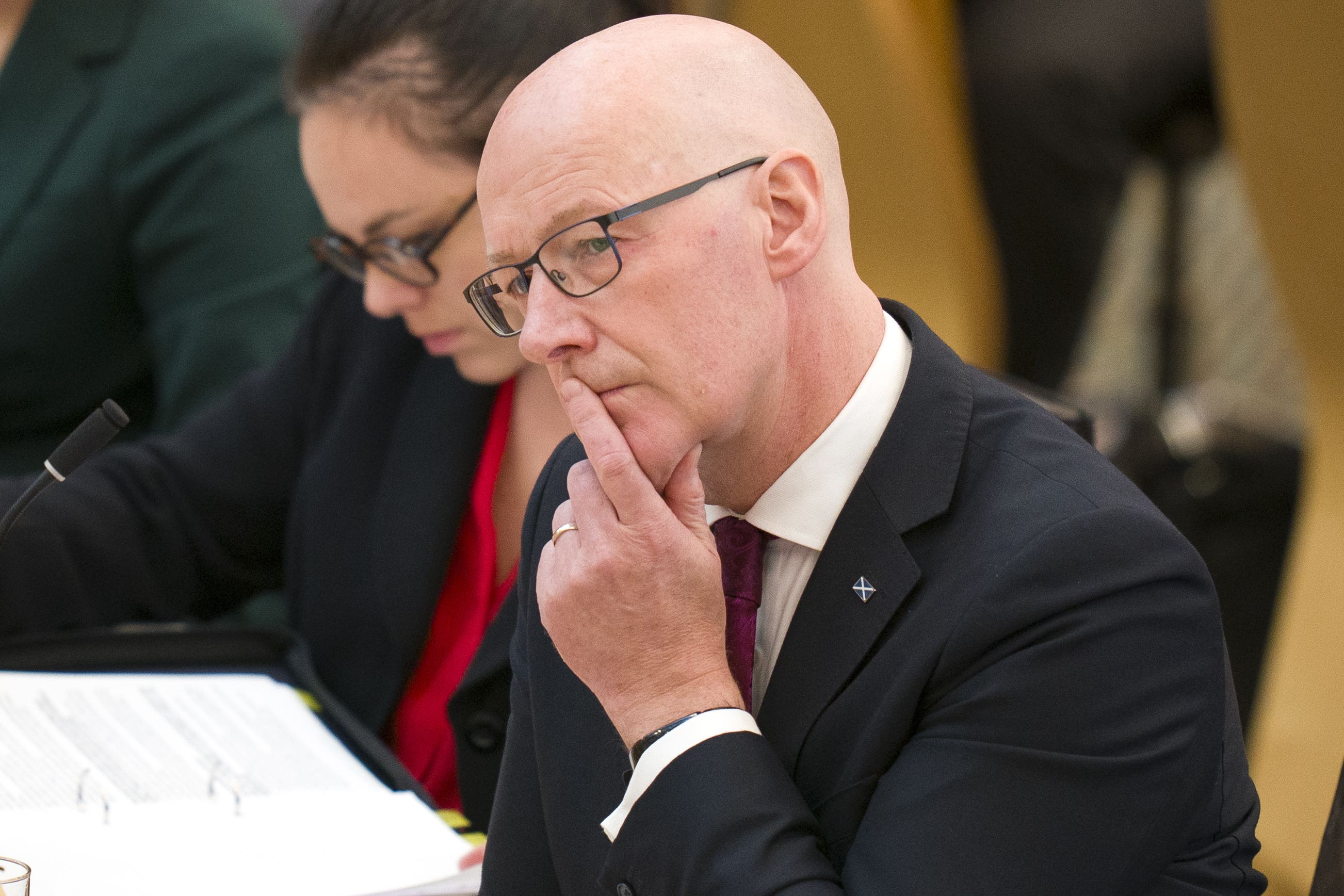 John Swinney said he is ‘giving thought’ to continuing to use the social media platform X – as he branded its owner Elon Musk a ‘malign influence’. (Jane Barlow/PA)