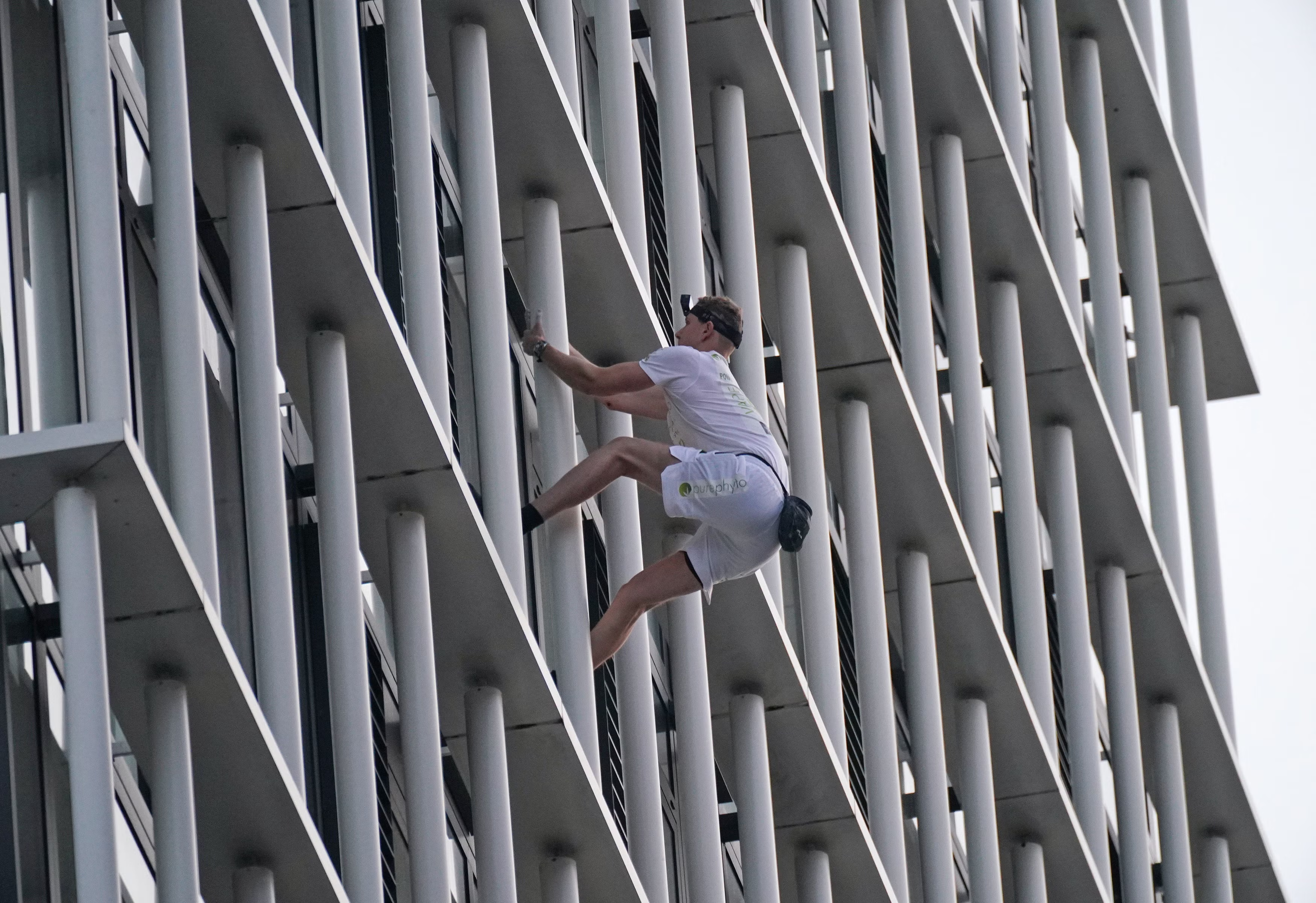 King climbs a 36-storey tower in east London in 2021