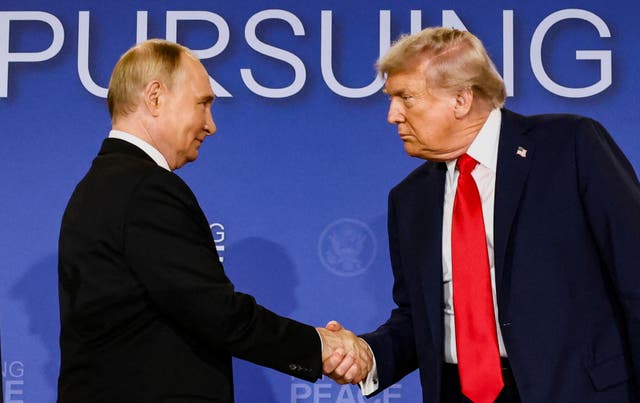 <p>US President Donald Trump and Russian President Vladimir Putin shake hands during a press conference following their meeting to negotiate an end to the war in Ukraine</p>