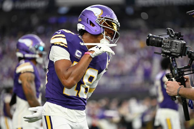 <p>Minnesota Vikings’ Justin Jefferson poses for the camera before the game against the Atlanta Falcons </p>