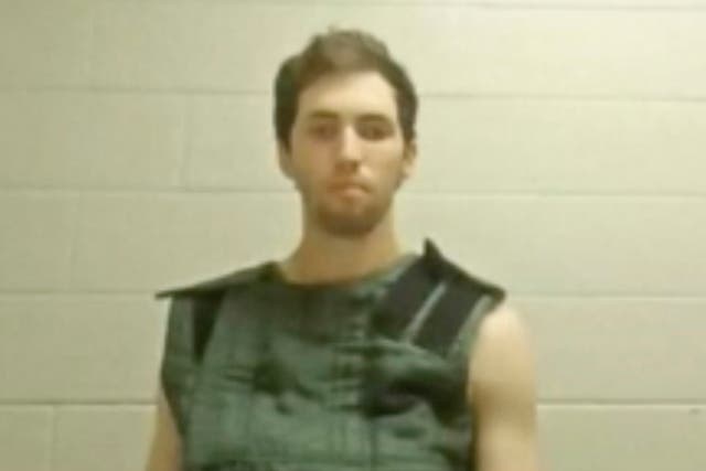 <p>In this image from video provided by Utah State Courts, Tyler James Robinson attends a virtual court hearing from prison to hear the charges for his alleged murder of Charlie Kirk</p>