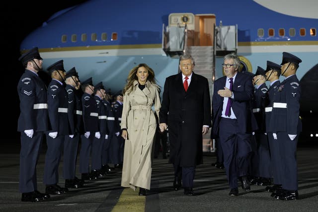 <p> President Donald Trump and First Lady Melania Trump disembark Air Force One after arriving at London Stansted Airport</p>