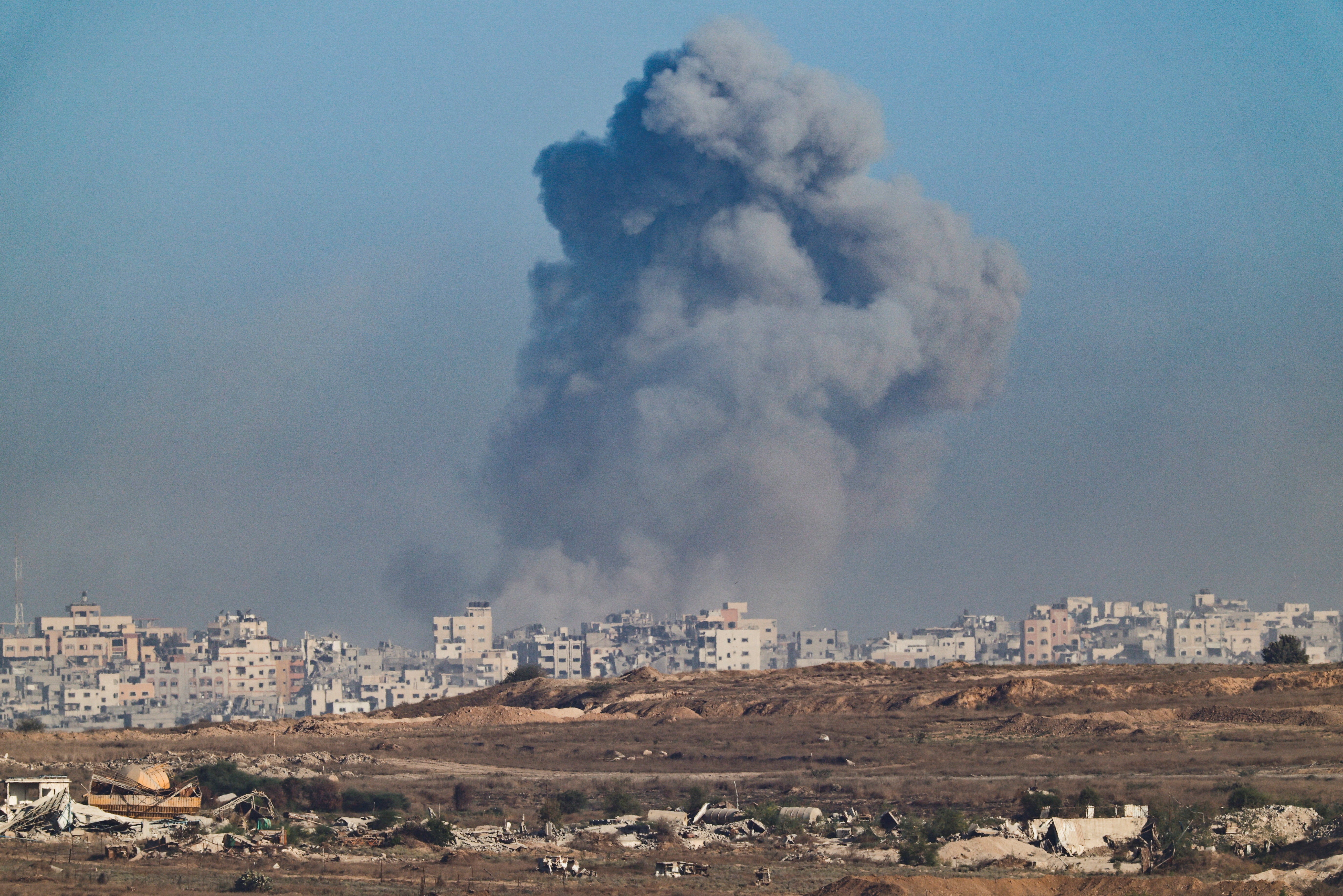 Smoke rises from Gaza after an explosion, as seen from the Israeli side of the border, 16 September 2025