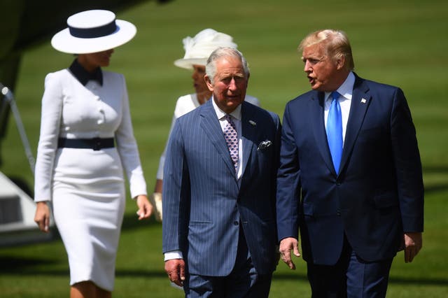 <p>US president Donald Trump walks with King Charles during a welcoming ceremony at Buckingham Palace in 2019</p>