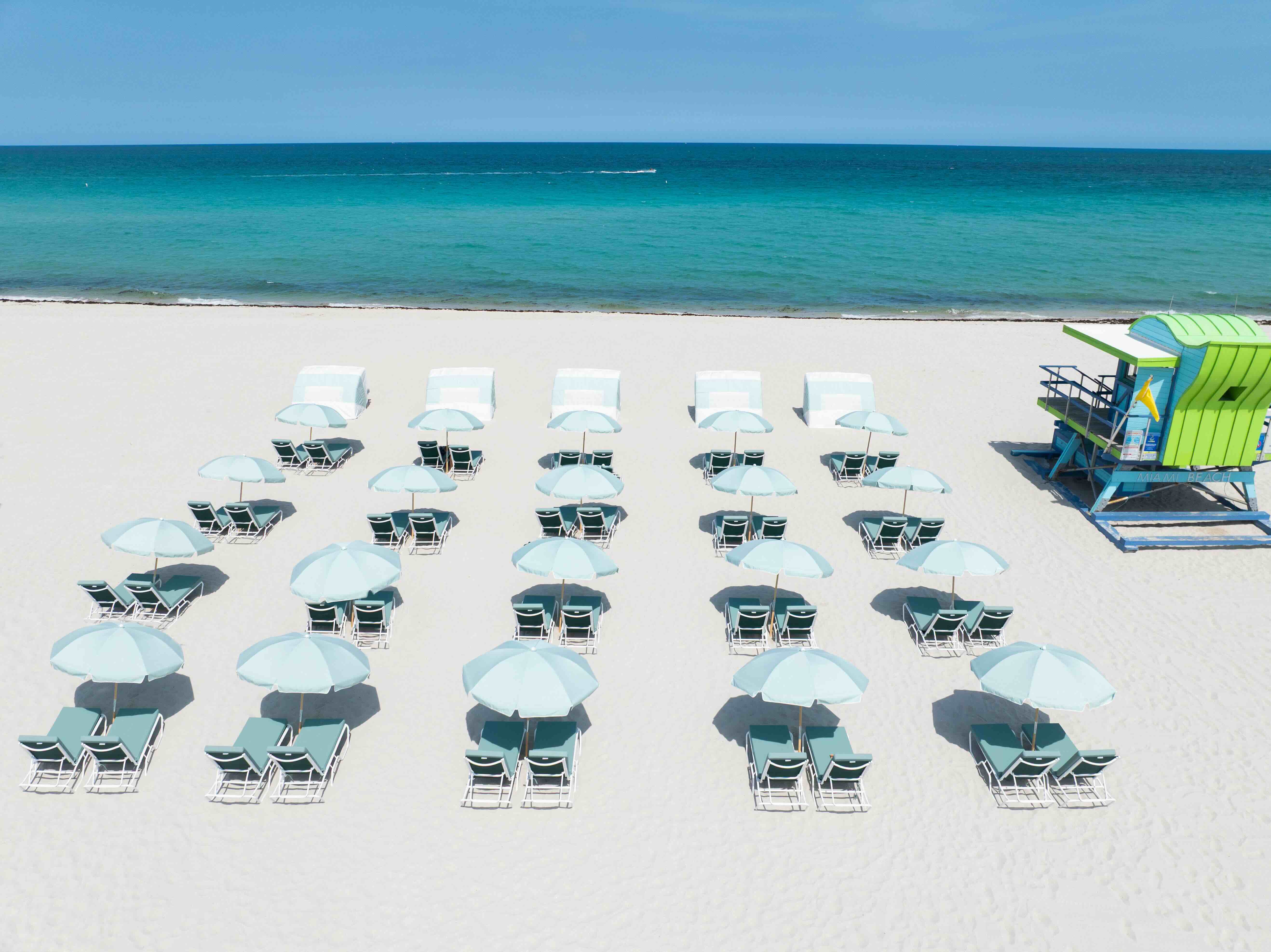 Shelborne Beach Club's loungers and parasols are available for guests on Miami Beach
