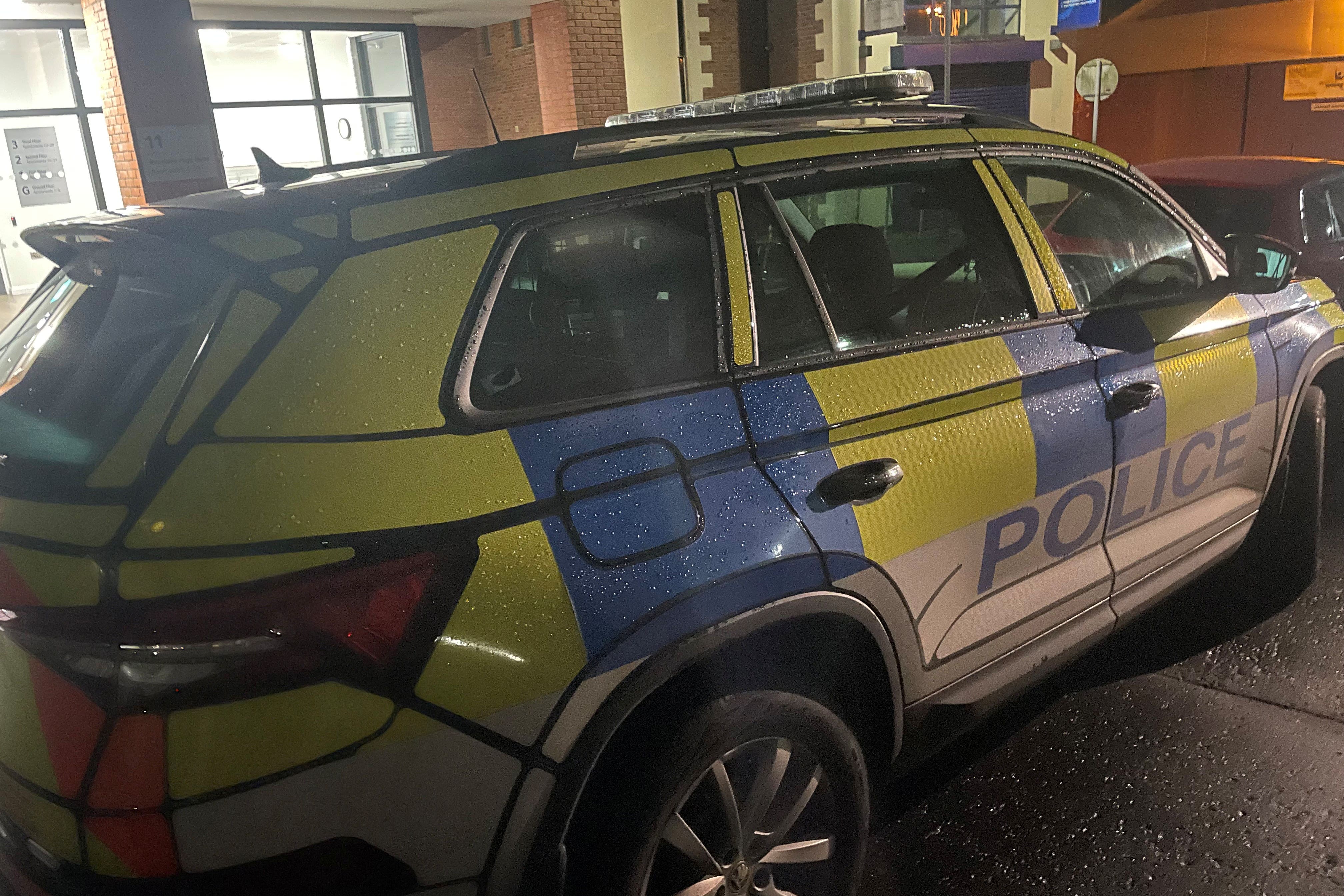 A police car in Wardsborough Road, Lisburn, where police have launched a murder investigation after the death of a 42-year-old man (Jonathan McCambridge/PA)