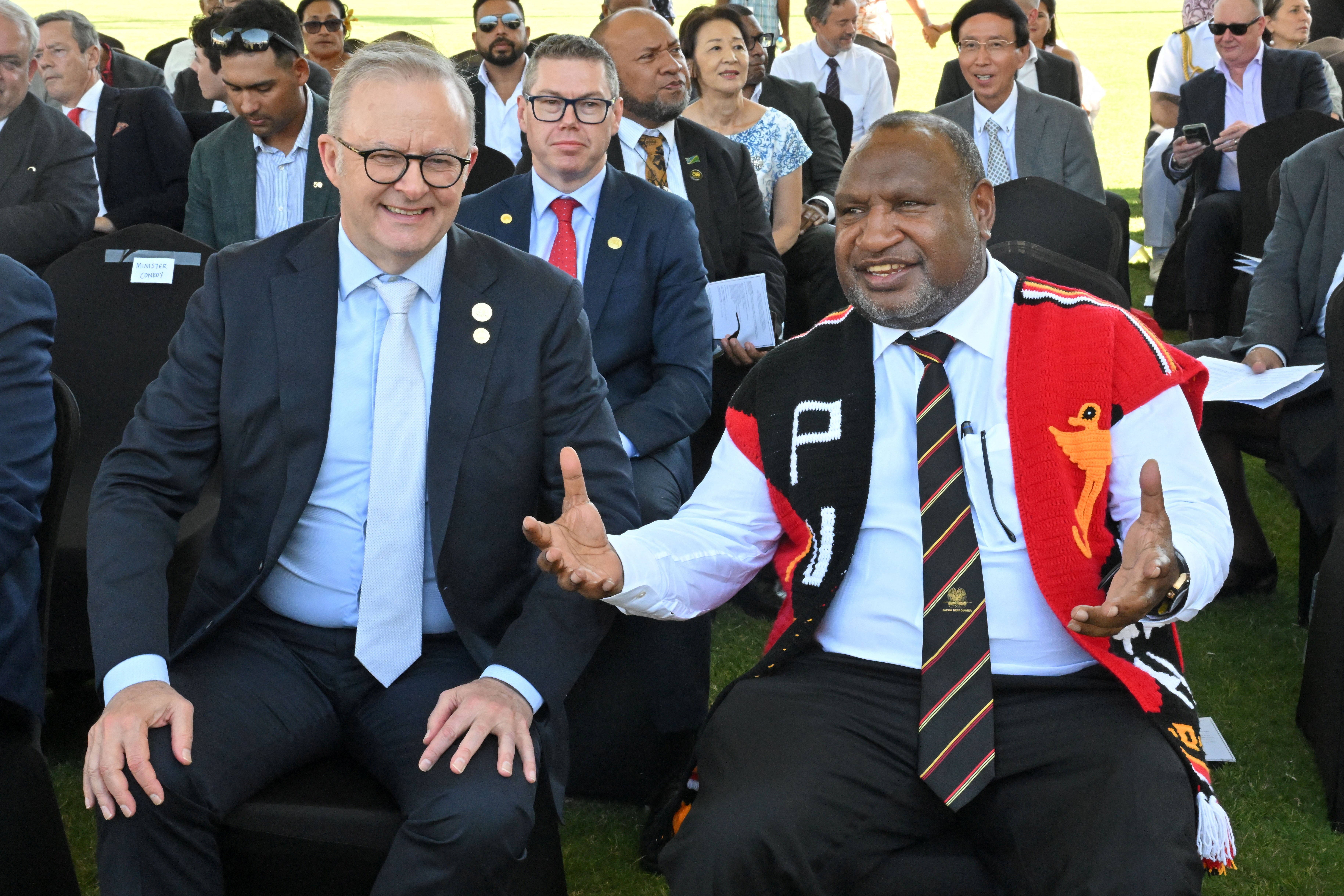 <p>Prime ministers Anthony Albanese of Australia and James Marape of Papua New Guinea attend a flag lowering ceremony in Port Moresby</p>