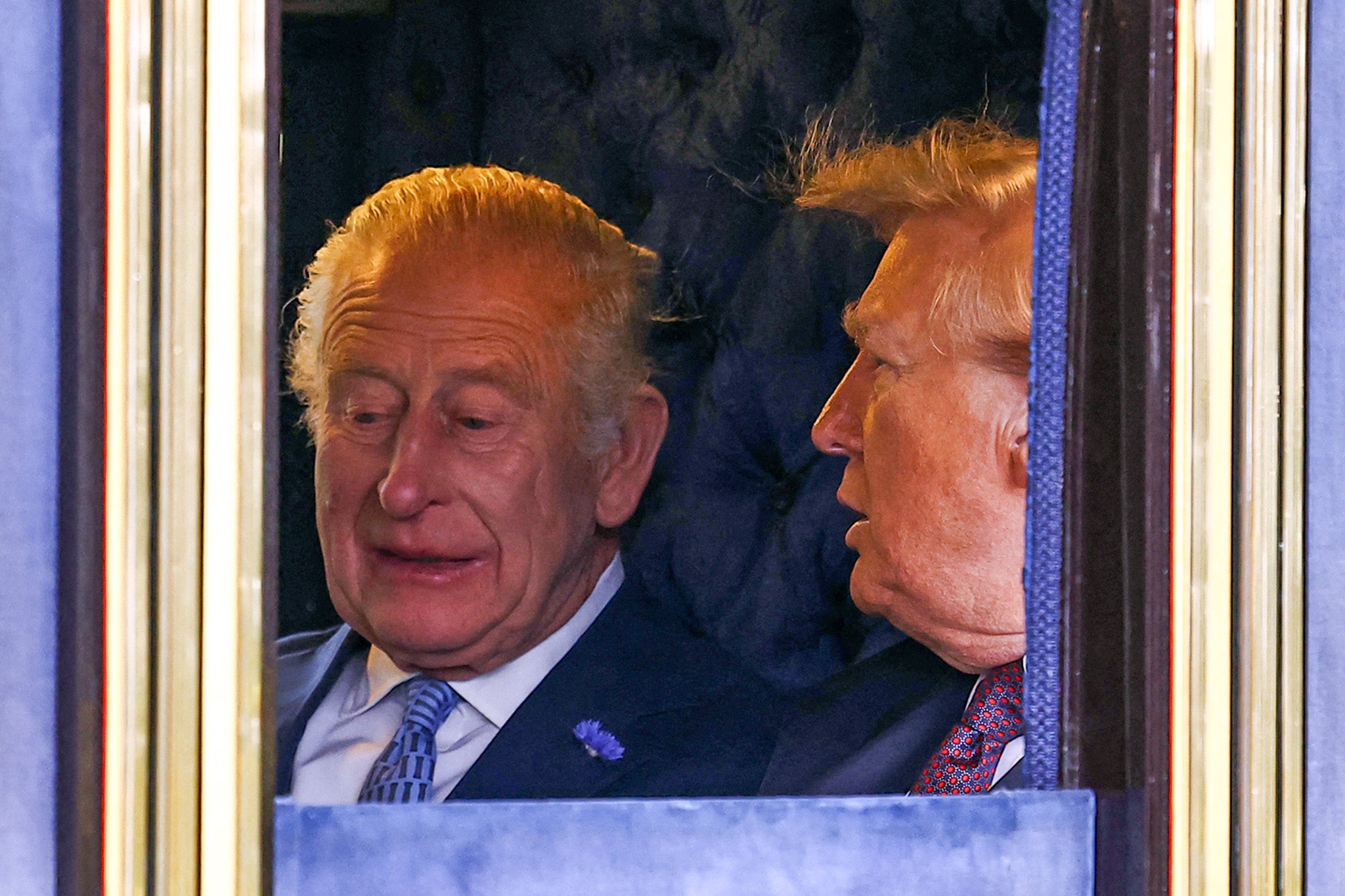 King Charles and US President Donald Trump travel in The Irish State Coach during a horse-drawn procession towards Windsor Castle