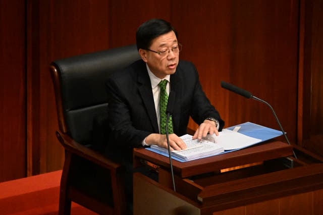 <p>Hong Kong chief executive John Lee delivers his annual policy address at Central Government offices </p>