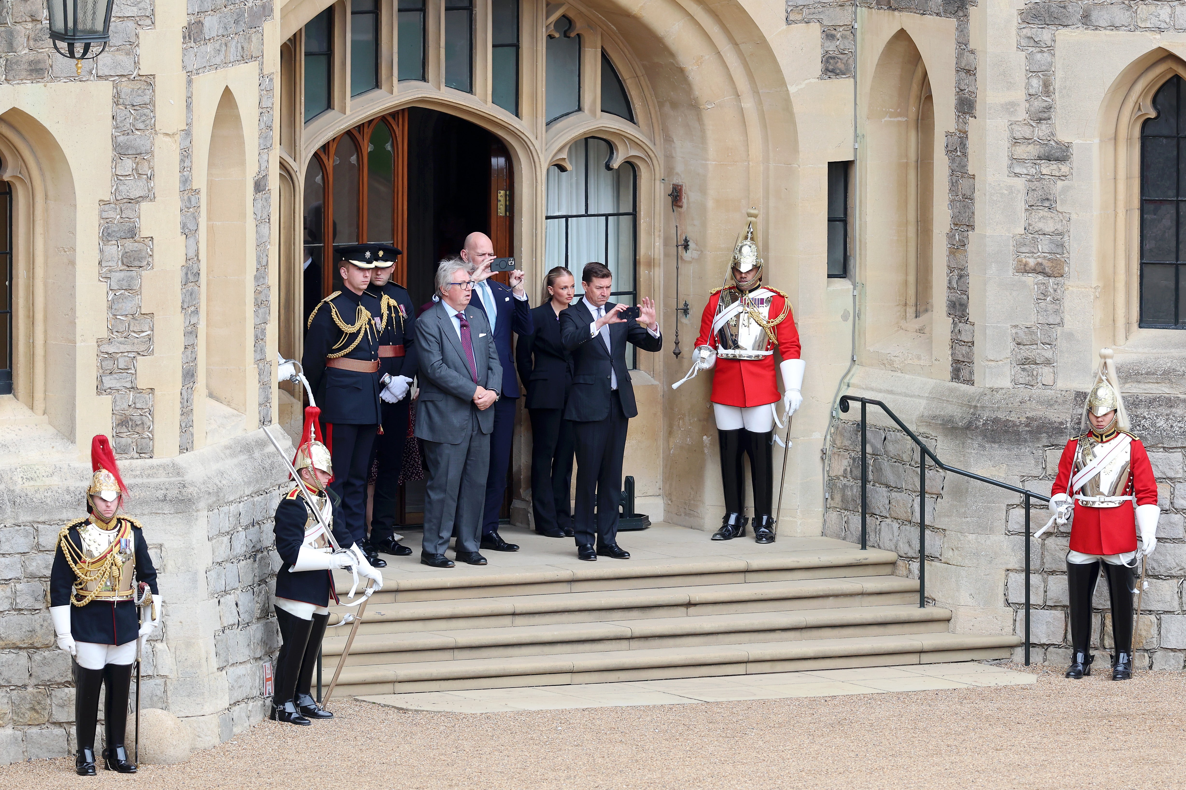 James Roscoe, the UK’s charge d’affaires in Washington, was seen at Windsor taking a picture of the spectacle during Donald Trump’s visit