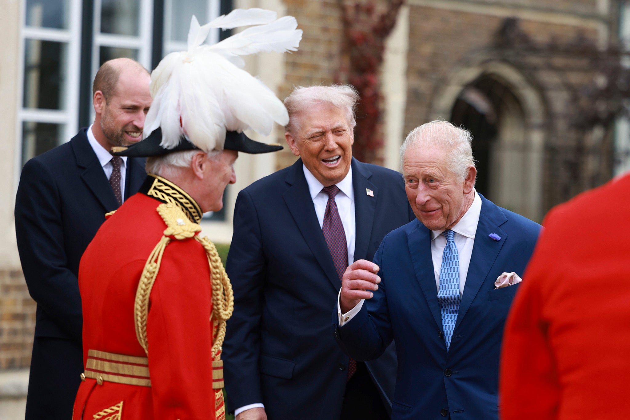Donald Trump shares a laugh with Charles