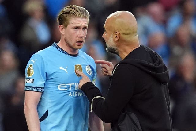 Kevin De Bruyne, pictured with Pep Guardiola, seems to have slotted in seamlessly with his new club (Martin Rickett/PA)