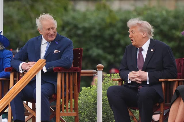 <p>King Charles III (left) talks with US President Donald Trump, during a Beating Retreat ceremony at Windsor Castle</p>