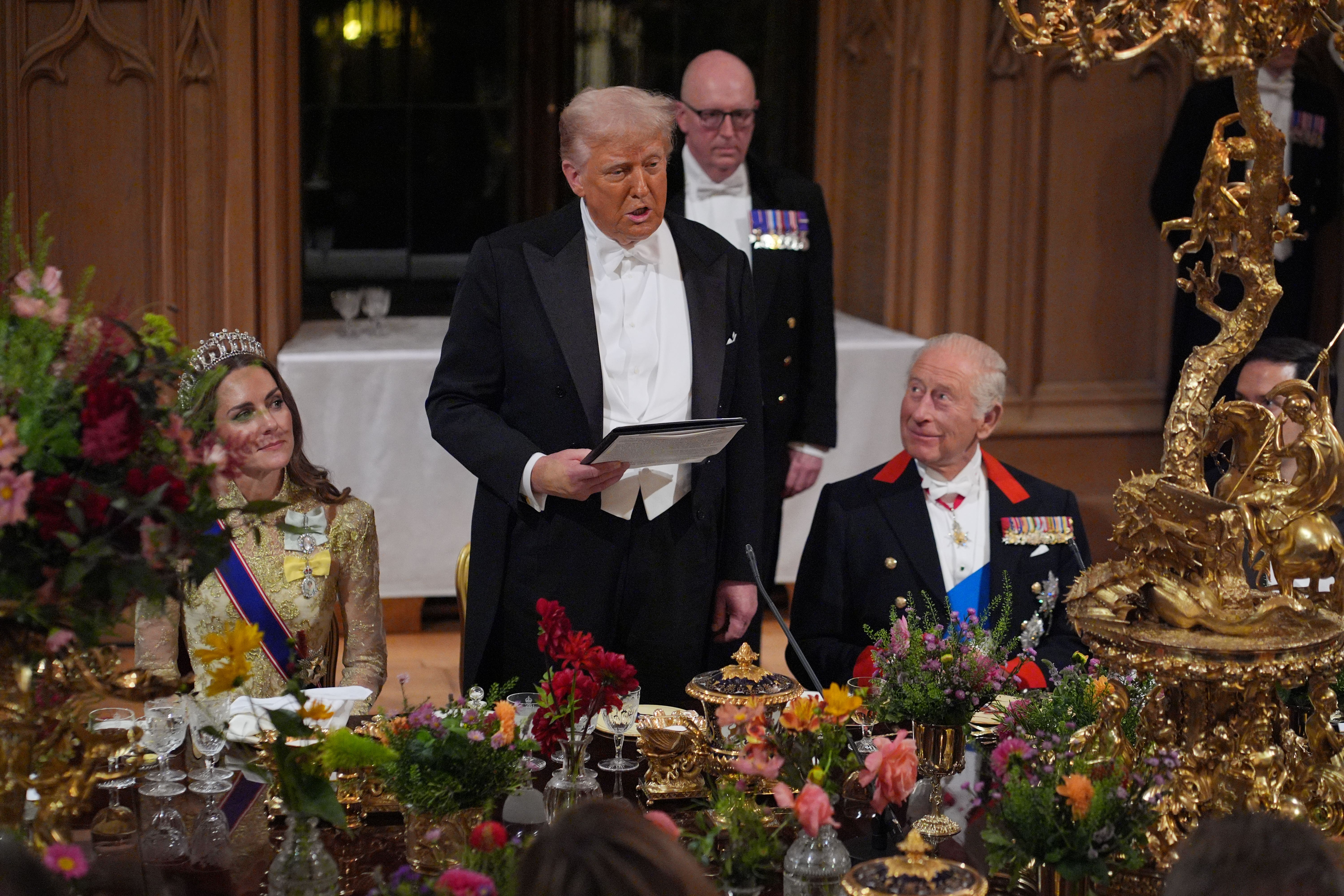 US President Donald Trump delivers his speech as the King and the Princess of Wales listen (Yui Mok/PA)